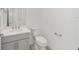 Modern half bath features a stylish vanity with quartz counters and modern faucet at 5894 Sw 77Th Ct, Ocala, FL 34481