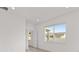 This bright bedroom features a window providing ample natural light at 5894 Sw 77Th Ct, Ocala, FL 34481