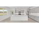 Beautiful kitchen with gray cabinets, a spacious island, and ample natural light at 5894 Sw 77Th Ct, Ocala, FL 34481