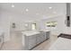 Contemporary kitchen with a large island, perfect for cooking and gathering at 5894 Sw 77Th Ct, Ocala, FL 34481