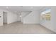 Bright living room with tile floors and staircase at 5894 Sw 77Th Ct, Ocala, FL 34481