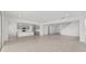 Expansive living space flows into a kitchen with an island, ideal for entertaining at 5894 Sw 77Th Ct, Ocala, FL 34481