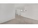 A cozy loft with neutral walls and carpet, perfect for relaxing or entertaining at 5894 Sw 77Th Ct, Ocala, FL 34481