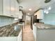 A spacious kitchen boasting stainless steel appliances and granite countertops at 6134 Se Stetson Rd, Belleview, FL 34420