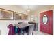 Cozy dining area features stylish table set, decorative artwork, and a chandelier at 6468 Sw 107Th Pl, Ocala, FL 34476