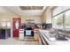 Well-lit kitchen featuring stainless steel appliances, tiled backsplash, and convenient layout at 6468 Sw 107Th Pl, Ocala, FL 34476