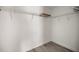 Walk-in closet with ample shelving and vinyl flooring at 7299 Sw 202 Ct, Dunnellon, FL 34431