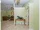 Inviting living room featuring tile floors, ceiling fan, and an open floor plan at 7475 Se 105Th Pl, Belleview, FL 34420