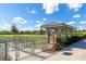 A fully fenced dog park with a shelter provides a safe and enjoyable space for pets and their owners at 8111 Sw 95Th Ct, Ocala, FL 34481