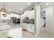 Bright kitchen with stainless steel appliances and granite countertops at 8111 Sw 95Th Ct, Ocala, FL 34481
