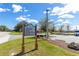 A community sign highlights a variety of outdoor activities, including an archery range and dog park at 8111 Sw 95Th Ct, Ocala, FL 34481