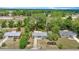 Neighborhood aerial showcasing home with mature trees, and landscaping at 8449 Sw 105Th Pl, Ocala, FL 34481