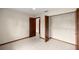 Well-lit bedroom with closet, ceiling fan, and tile flooring at 8449 Sw 105Th Pl, Ocala, FL 34481