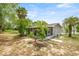 Scenic view of the backyard with patio and trees at 8449 Sw 105Th Pl, Ocala, FL 34481