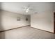 Bright living room featuring tile floors and neutral walls, with ample space for customization and decor at 8449 Sw 105Th Pl, Ocala, FL 34481
