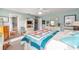 Bedroom with connecting bath, and decorative furniture at 8722 Sw 60Th Cir, Ocala, FL 34476