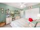 Bedroom showcasing ample closet space, dresser, shelving, and soft, pastel-colored decor at 8722 Sw 60Th Cir, Ocala, FL 34476