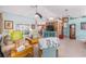 Cozy living room featuring neutral carpeting, comfortable seating, and a ceiling fan at 8722 Sw 60Th Cir, Ocala, FL 34476
