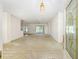 Spacious living room with views to backyard and kitchen at 9649 Sw 90Th St, Ocala, FL 34481