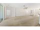 Expansive living room with access to outdoor area and kitchen, perfect for entertaining at 9649 Sw 90Th St, Ocala, FL 34481