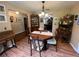 Elegant dining room featuring a wooden table, ornate chairs, and vintage accents at 9850 Sw 191St Ave, Dunnellon, FL 34432