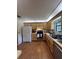 Functional kitchen with light wood cabinets and stainless steel appliances at 9850 Sw 191St Ave, Dunnellon, FL 34432