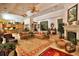 Open living area with a fireplace and direct access to kitchen at 1300 Sw 43Rd Pl, Ocala, FL 34471