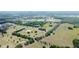 Picturesque aerial shot showcasing expansive acreage with mature trees, and multiple home sites at 0000 Se 116Th Place Rd, Ocala, FL 34480