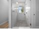 Beautiful bathroom featuring a tiled shower with a glass door at 1058 Se 59Th St, Ocala, FL 34480