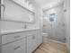 Bathroom features a large vanity, a toilet and shower with glass door at 1058 Se 59Th St, Ocala, FL 34480