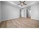 Spacious bedroom featuring wood-look floors, and neutral paint at 1058 Se 59Th St, Ocala, FL 34480