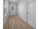 Entryway with hardwood floors, neutral paint, and lots of natural light at 1058 Se 59Th St, Ocala, FL 34480