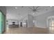 Spacious living room features vaulted ceilings, recessed lighting, and modern ceiling fan at 1058 Se 59Th St, Ocala, FL 34480