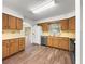 Spacious kitchen with stainless steel appliances and ample cabinetry at 10739 Se 44Th Ter, Belleview, FL 34420