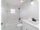 Bathroom featuring modern fixtures, shower-tub combination, and white vanity at 13115 Sw 49Th Ave, Ocala, FL 34473