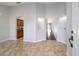 Inviting foyer featuring tiled flooring, arched doorways, and recessed lighting at 13115 Sw 49Th Ave, Ocala, FL 34473