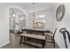 Bright dining room with modern chandelier and ample natural light at 15 Sunrise Dr, Ocala, FL 34472