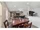 Open dining area with access to the living room and kitchen, perfect for entertaining at 15 Sunrise Dr, Ocala, FL 34472