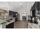 Well-equipped kitchen with modern appliances and a view into the dining area at 15 Sunrise Dr, Ocala, FL 34472