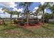 Secluded backyard featuring a screened pool, mature landscaping, and ample space for entertaining at 15 Sunrise Dr, Ocala, FL 34472