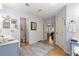 Bright bathroom with tile flooring, double vanity, and doorways leading to bedroom, toilet, and closet at 15825 Sw 11Th Court Rd, Ocala, FL 34473