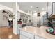 Well-equipped kitchen with breakfast bar, stainless steel appliances, and seamless flow into the living space at 15825 Sw 11Th Court Rd, Ocala, FL 34473
