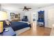 The main bedroom offers neutral walls, a ceiling fan, and a gorgeous tile floor at 15825 Sw 11Th Court Rd, Ocala, FL 34473