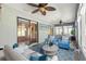 Bright sun room with abundant natural light, and comfortable seating for relaxing and entertaining at 15825 Sw 11Th Court Rd, Ocala, FL 34473