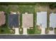 Overhead view of three homes showing roof and landscaping at 1690 Sw 158Th Ln, Ocala, FL 34473
