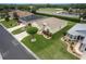 Aerial view of well-maintained home and lawn in community at 1690 Sw 158Th Ln, Ocala, FL 34473