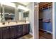 Main bathroom with double sinks, a walk-in closet and a large vanity with cabinets at 1690 Sw 158Th Ln, Ocala, FL 34473