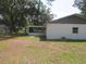 Exterior showcasing a screened-in lanai, perfect for relaxing and enjoying the outdoors at 17315 Se 18Th St, Silver Springs, FL 34488