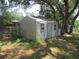 Exterior of a storage shed, offering extra space for tools and equipment at 17315 Se 18Th St, Silver Springs, FL 34488