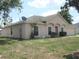 Well-maintained single-story home with tidy front yard and attached two-car garage at 1754 Sw 160Th Pl, Ocala, FL 34473